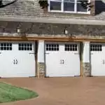 three single garage doors