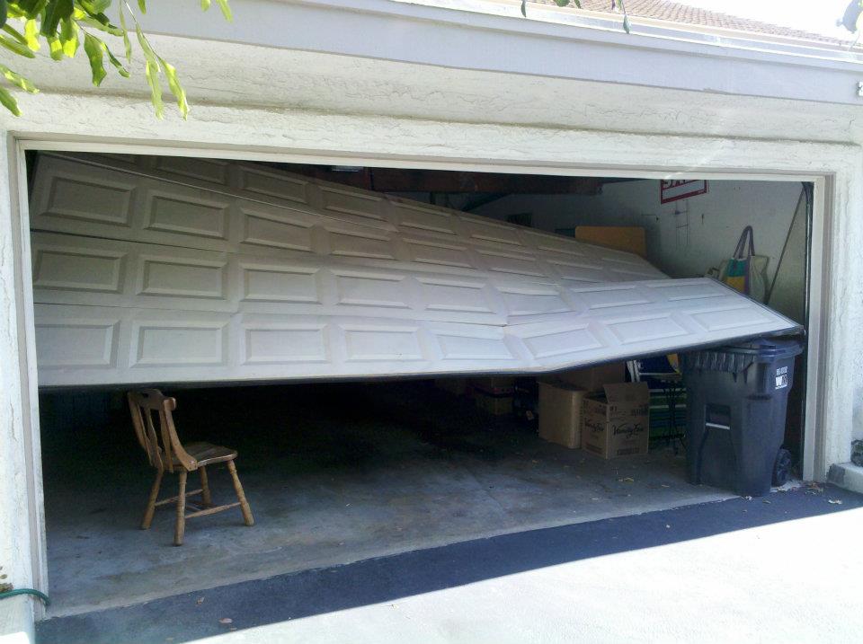 Creative Garage Door Dent Fix for Small Space