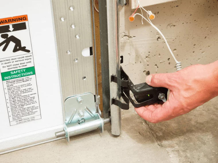 How To Repair Garage Door Sensors - Your Garage Door Guys