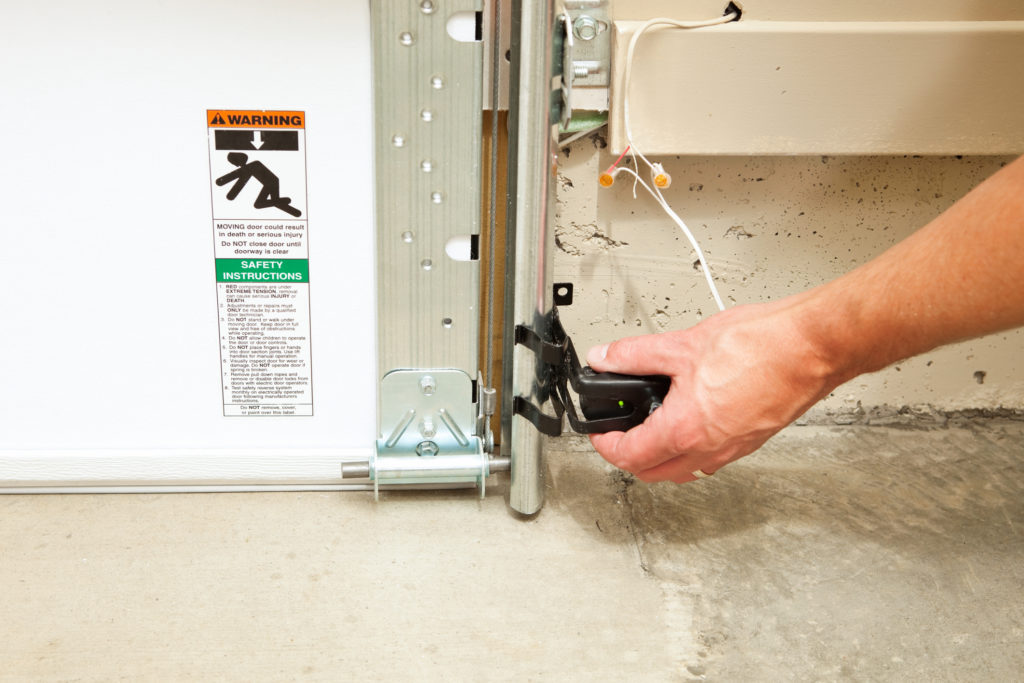 Why a Garage Door Safety Sensors Breaks? | Your Garage Door Guys