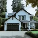 white house with dark gray trim and matching dark gray garage door