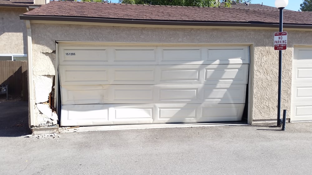 broken garage door in need of garage door repair simi valley - Your Garage Door Guys