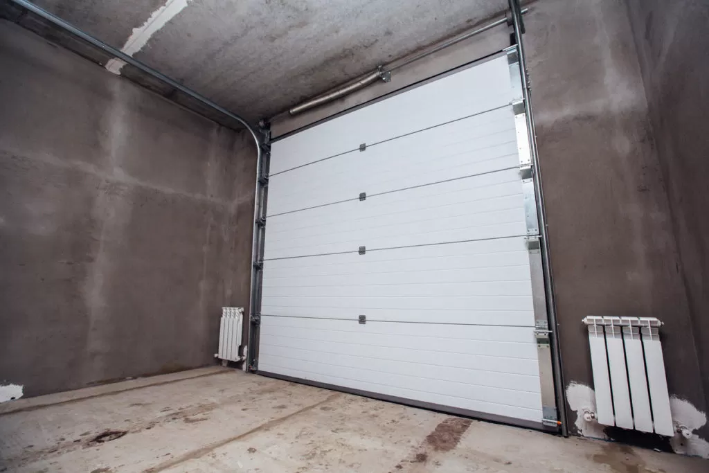 how to clean garage door tracks