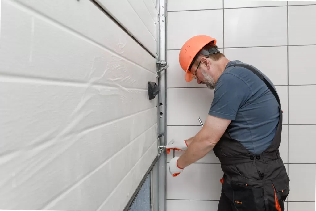 Who Fixes Garage Doors? How to Find A Professional Near You | Your Garage Door Guys