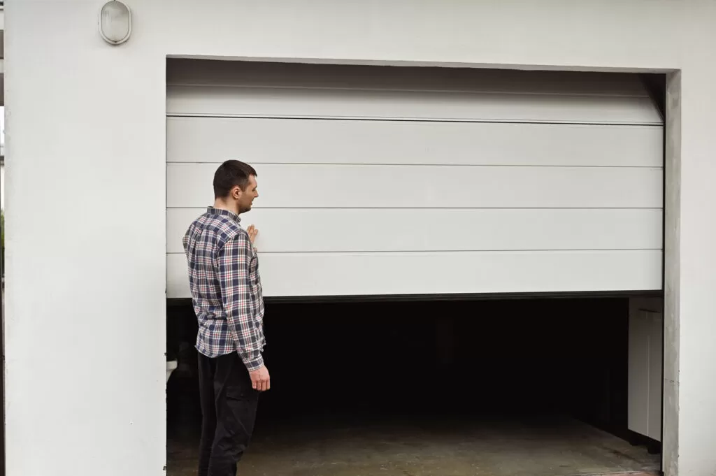 Why Is My Garage Door Stuck? Common Causes and Solutions | Your Garage Door Guys